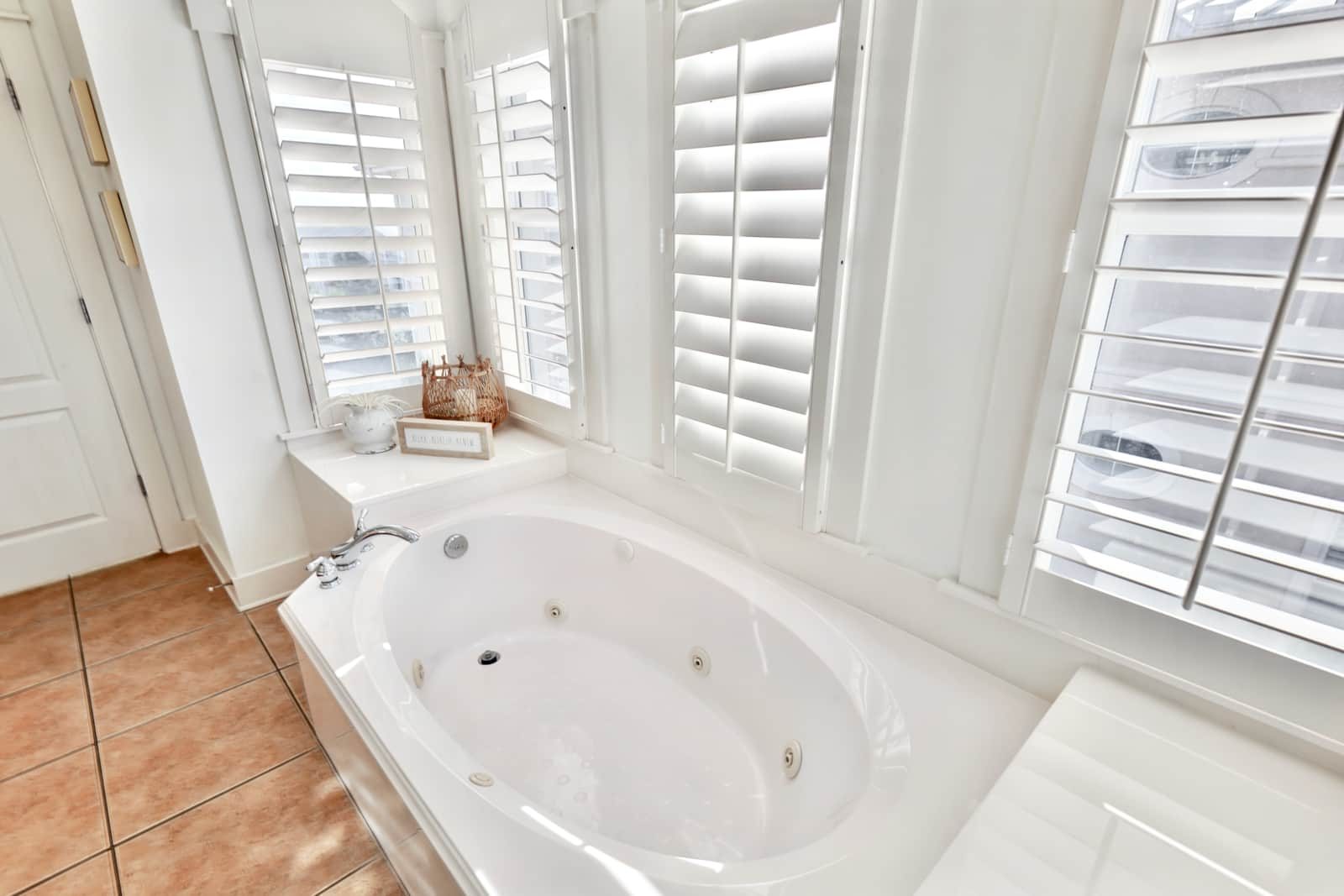 Bath with soaking tub